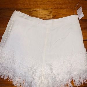 Endless Ross size small white shorts with fringe